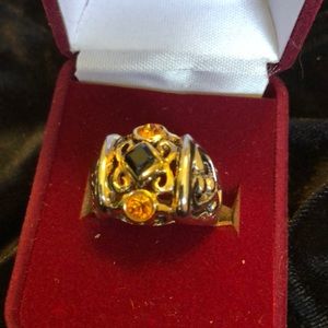 Silver tone and crystal ring